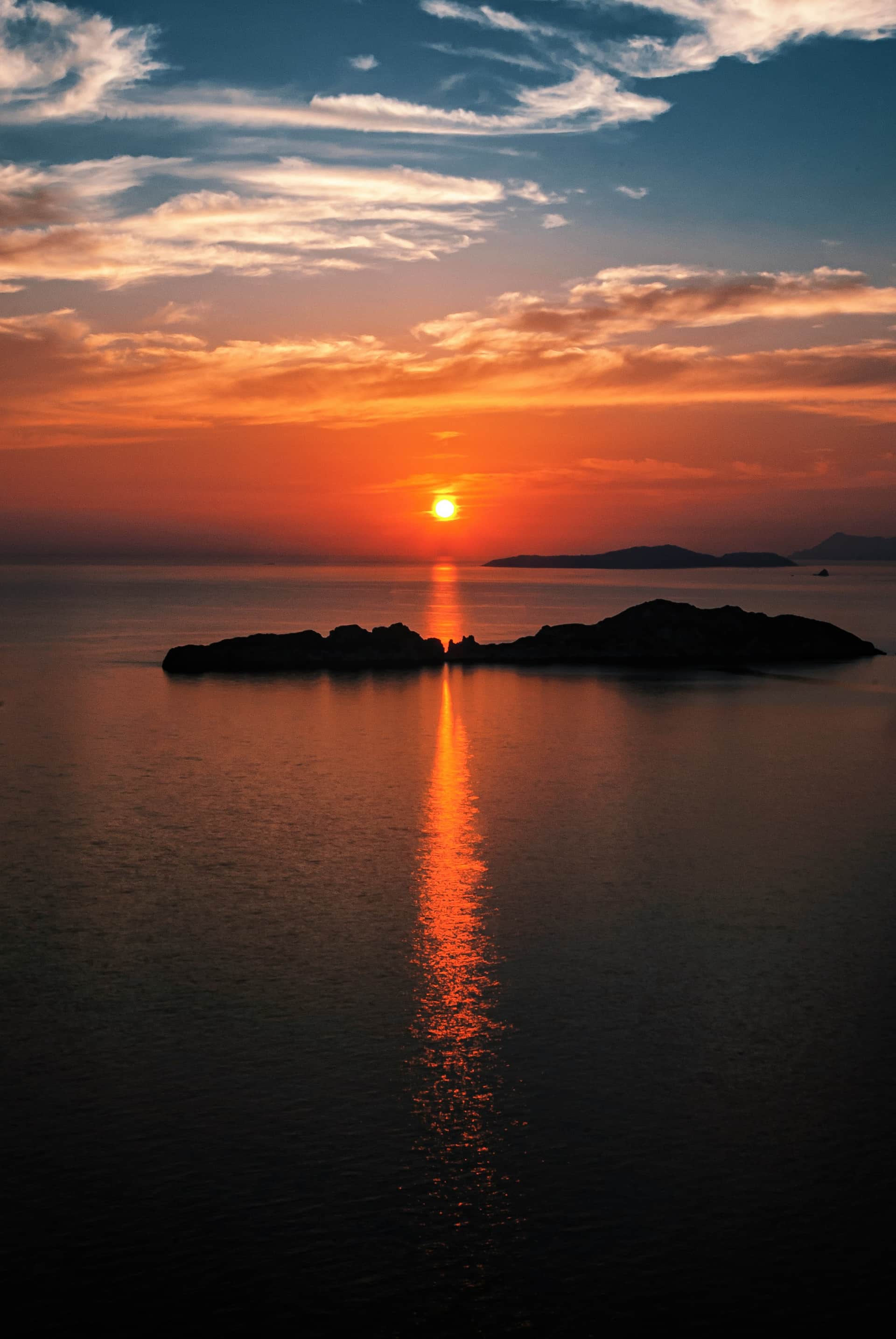Sunset cruise Ionian Sea private boat golden hour