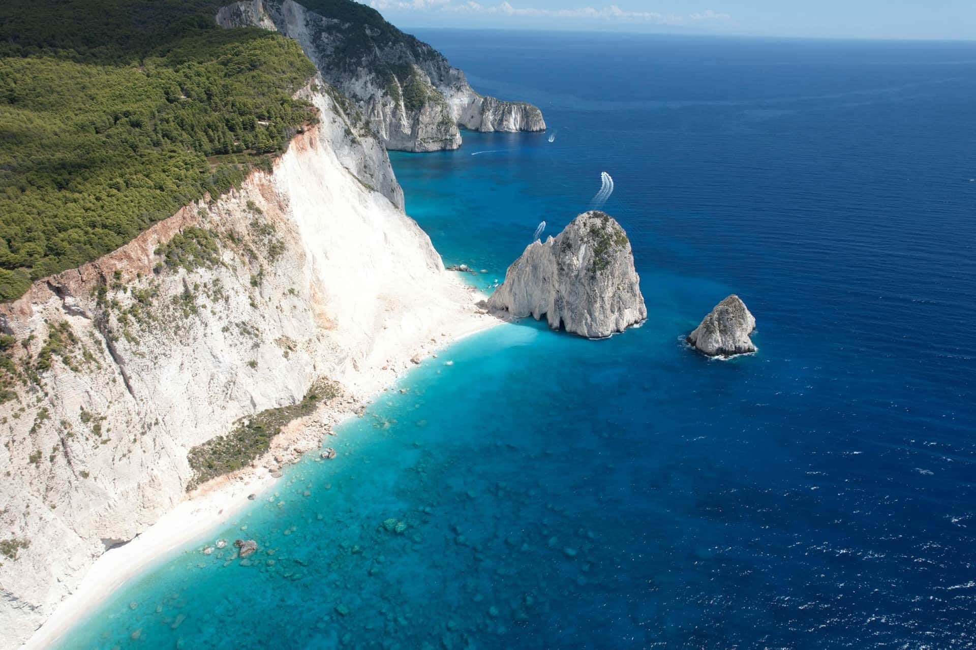 Private boat cruise Lefkada island Greece - white cliffs and turquoise water